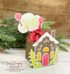 Handmade paper gingerbread house. Saying "Have a sweet Christmas"